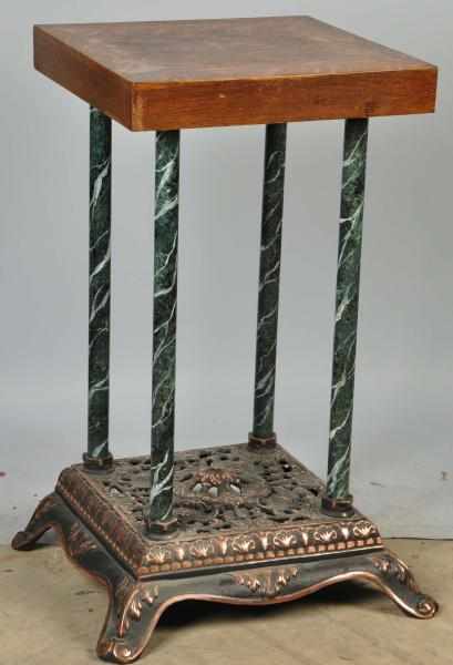 Appraisal: Cast Iron Slot Machine Base Description With oak top stand