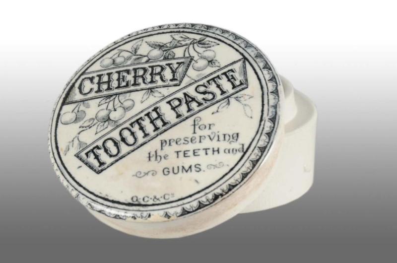 Appraisal: Circular Cherry Tooth Paste Pot Lid Description Minor chips Condition