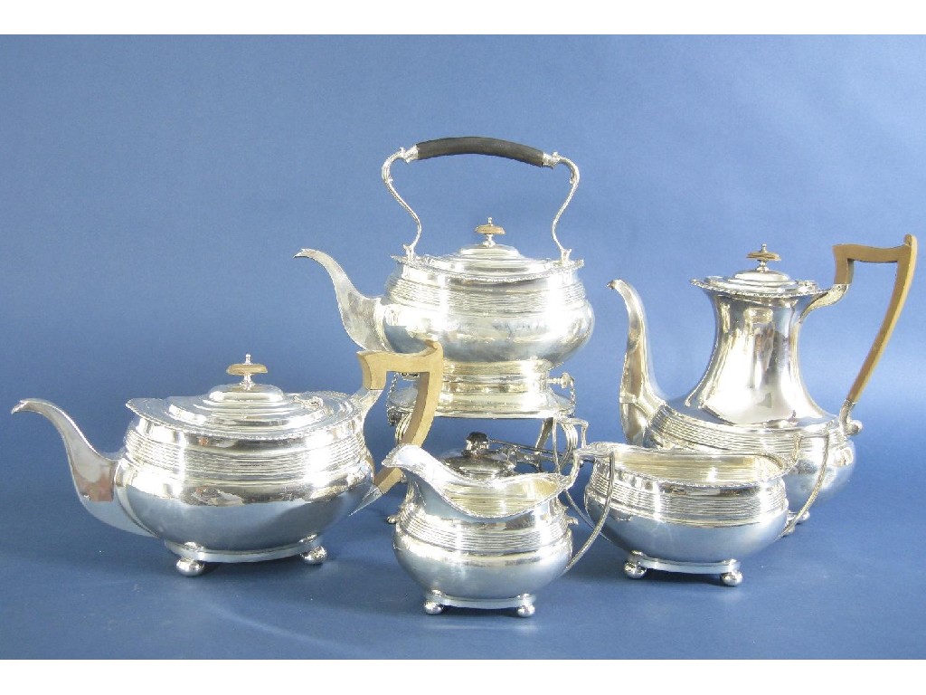 Appraisal: A George V Tea Kettle on Stand of boat shape