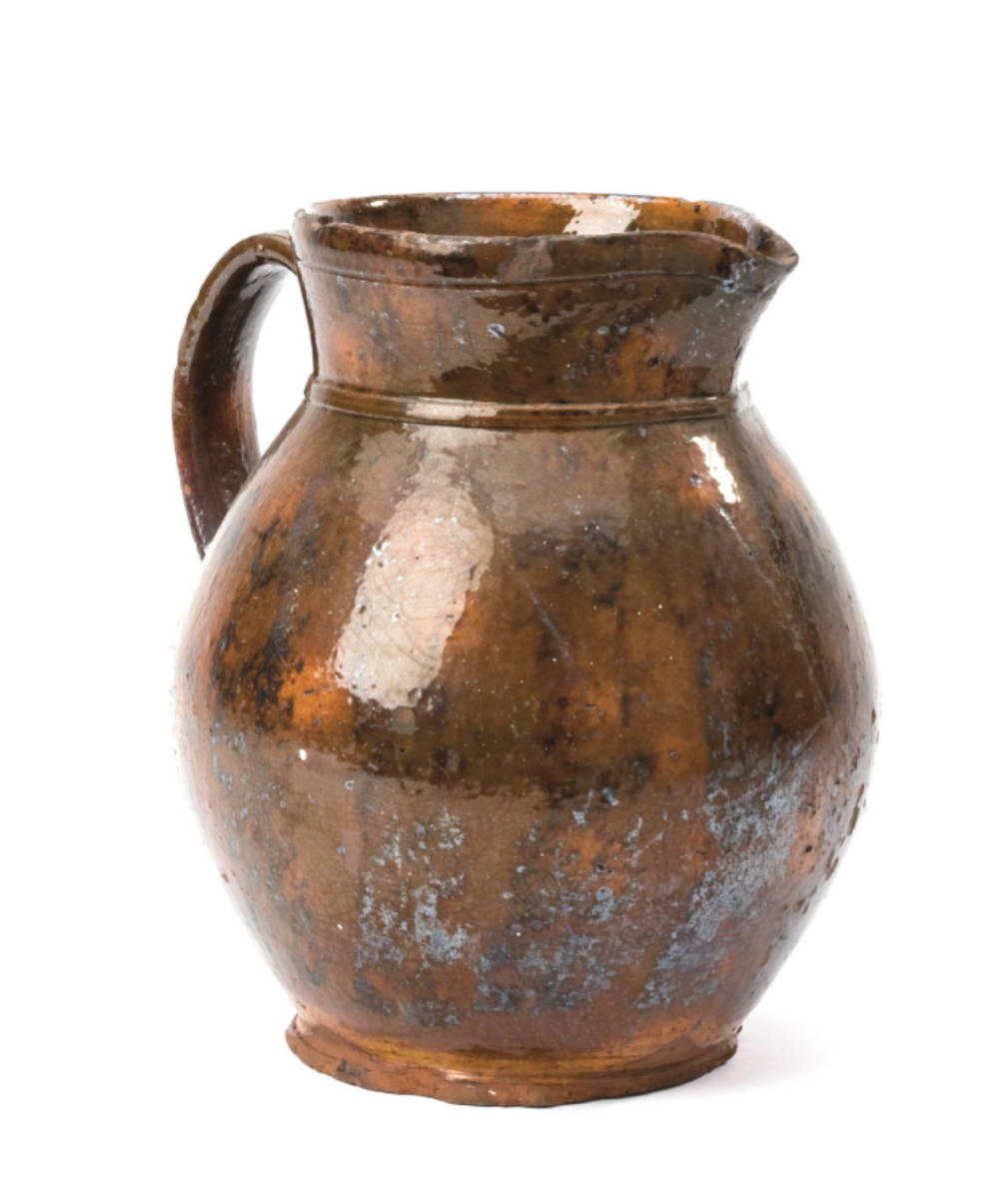 Appraisal: GLAZED REDWARE PITCHER POSSIBLY MASSACHUSETTS NINETEENTH CENTURY Of bulbous form