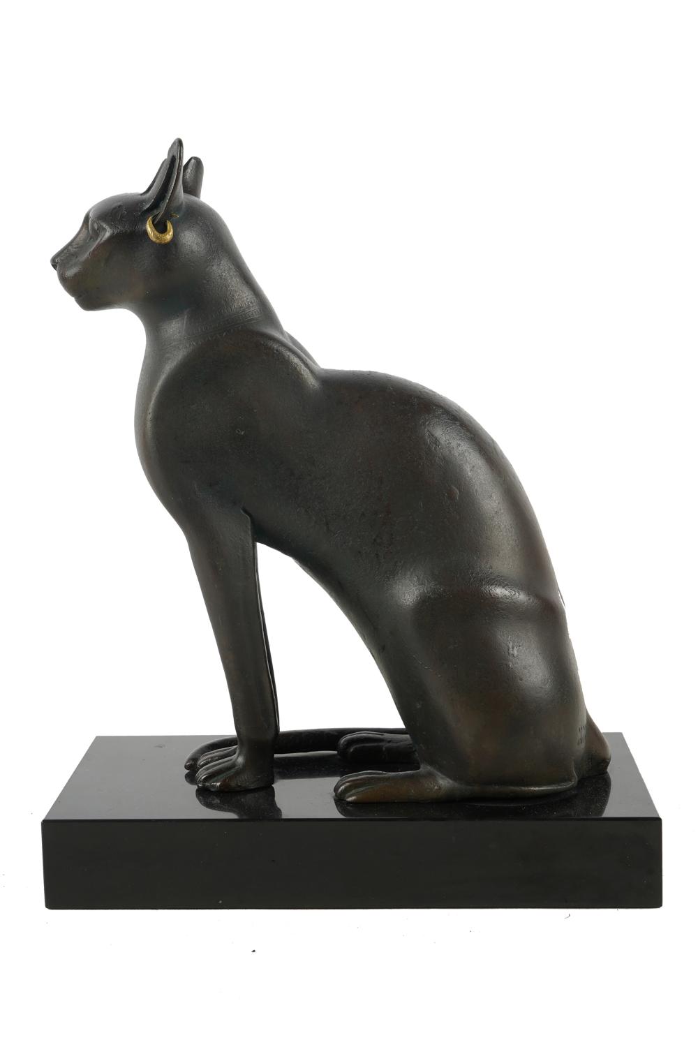 Appraisal: EGYPTIANESQUE BRONZE CATmodern reproduction set atop black marble plinth stamped