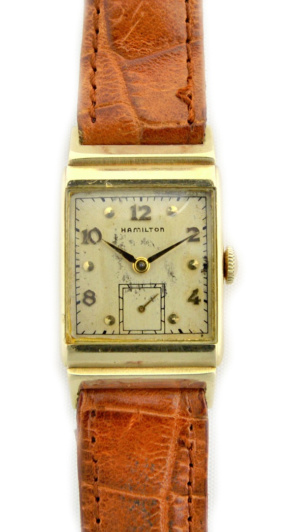 Appraisal: A Hamilton gold rectangular cased gentleman's wristwatch the signed silvered