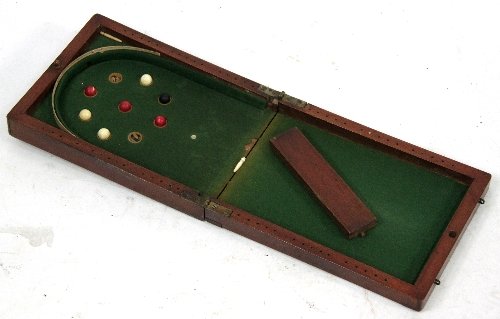 Appraisal: A game of bagatelle the folding mahogany case green baize