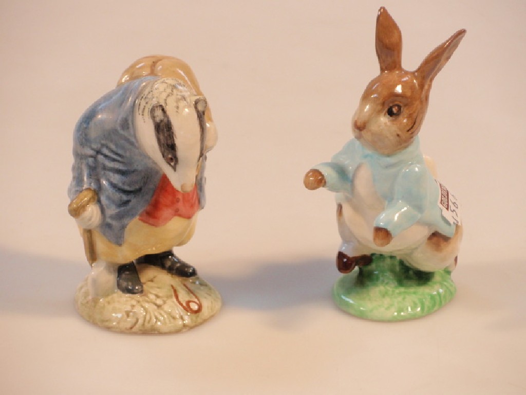 Appraisal: A Beswick Beatrix Potter figure 'Tommy Brock another 'Peter Rabbit'