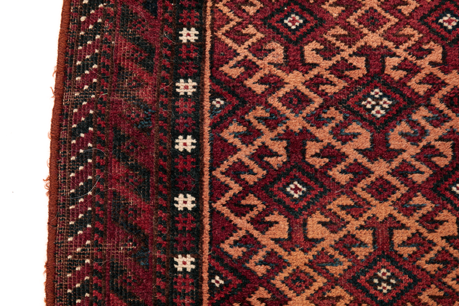 Appraisal: PERSIAN BALUCH MAT Ca Primarily red ' x '