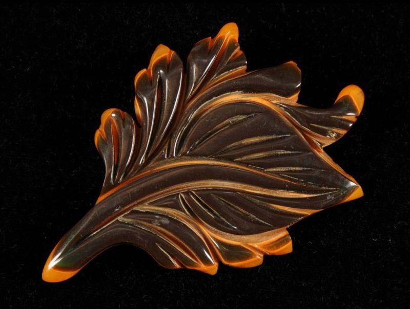 Appraisal: Bakelite Laminated Yellow Black Leaf Pin Condition Excellent Size -