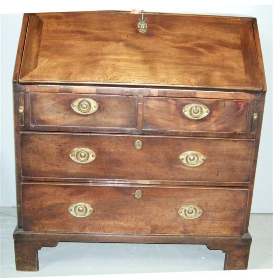 Appraisal: George III mahogany bureau the interior with pigeon holes drawers