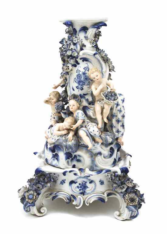 Appraisal: A Meissen Porcelain Figural Centerpiece Base having applied floral decoration