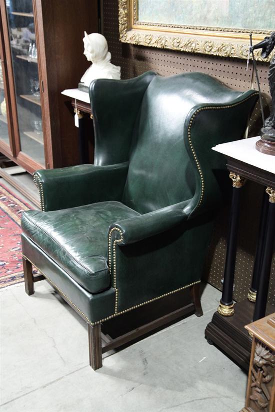 Appraisal: HICKORY CHAIR CO WINGBACK ARMCHAIR Green leather chair with tack