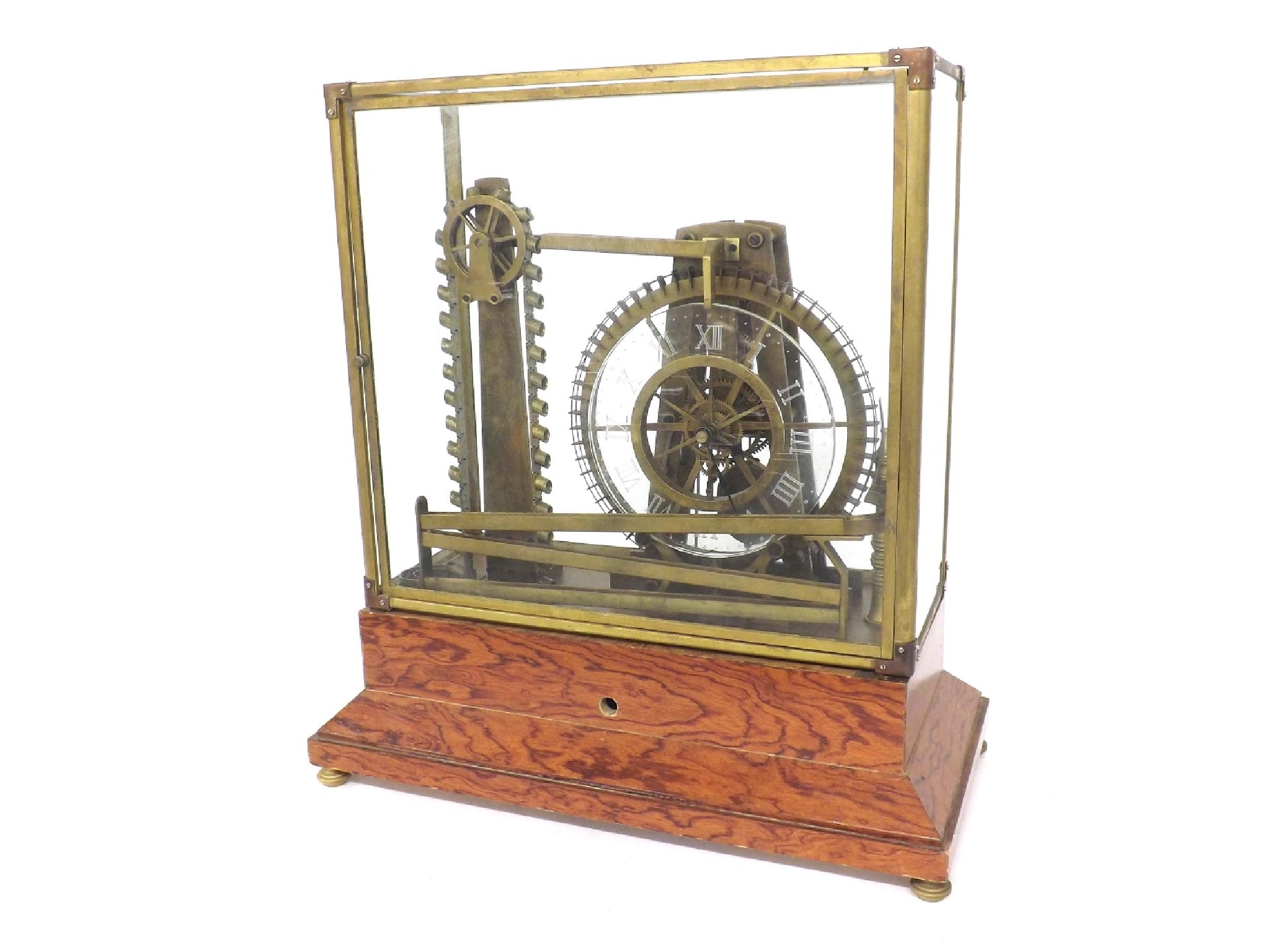 Appraisal: Reproduction skeletonised water wheel clock under a glazed brass framed