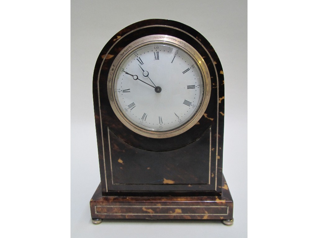 Appraisal: An Edwardian tortoiseshell and brass inlaid domed shaped mantel clock