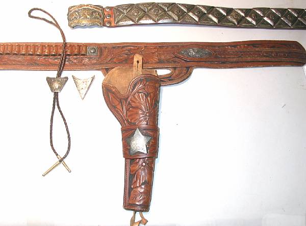 Appraisal: A tooled leather buscadero rig by Visalia Saddlery together with