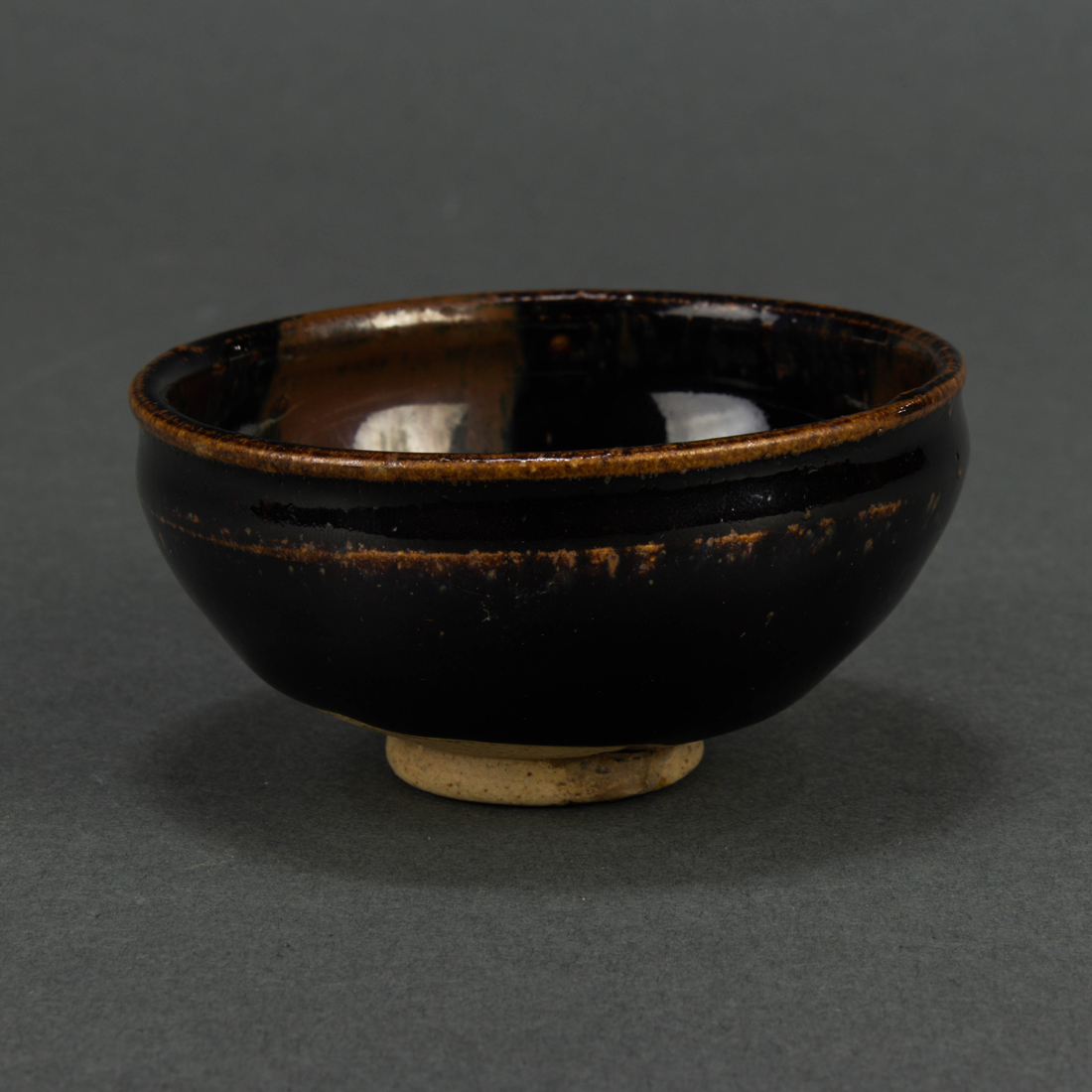 Appraisal: CHINESE BLACK GLAZED IRON SPLASH BOWL Chinese black glazed iron