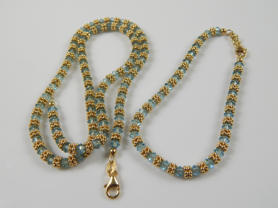 Appraisal: A bracelet and necklace set modern beaded design with ct