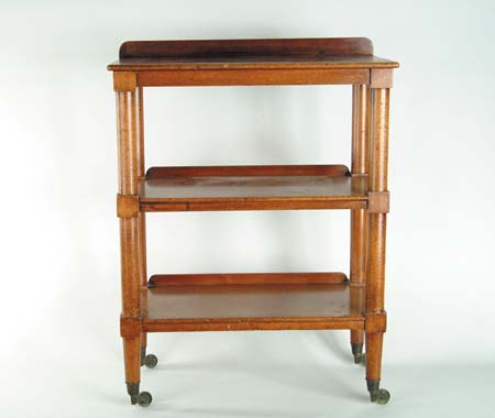 Appraisal: WALNUT BUTLER S TROLLY th Century Having three tiers supported