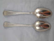 Appraisal: A pair of Georgian silver Hanoverian tablespoons with mermaid crests