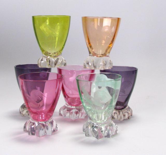 Appraisal: Seven colored crystal etched rooster motif glasses