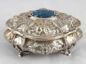 Appraisal: A continental grade silver casket of shaped oval form on