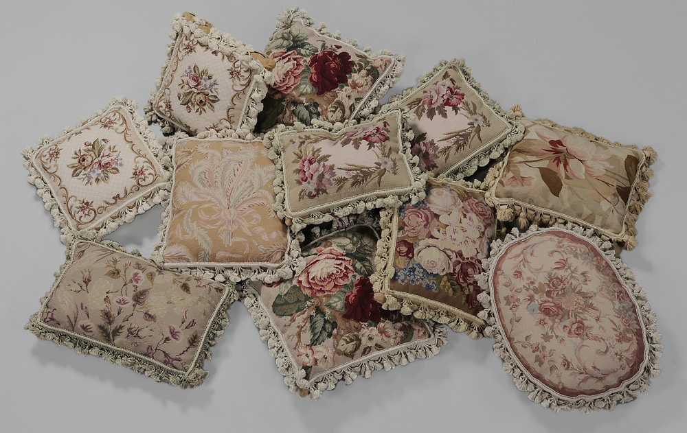 Appraisal: Eleven Needlepoint Pillows all with floral bouquets and tasseled edges