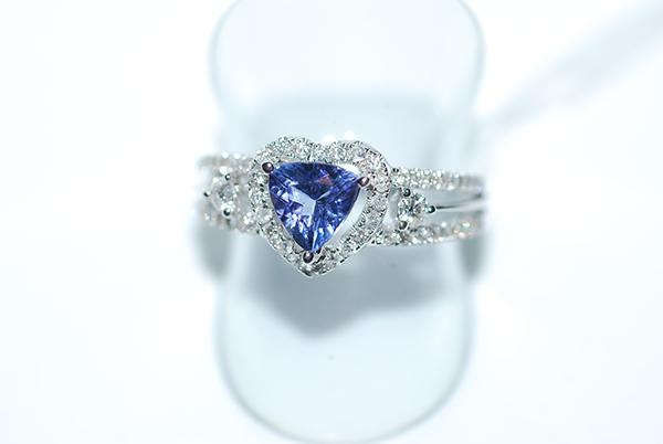 Appraisal: A HEART CUT TANZANITE CTS AND DIAMOND RING IN CT