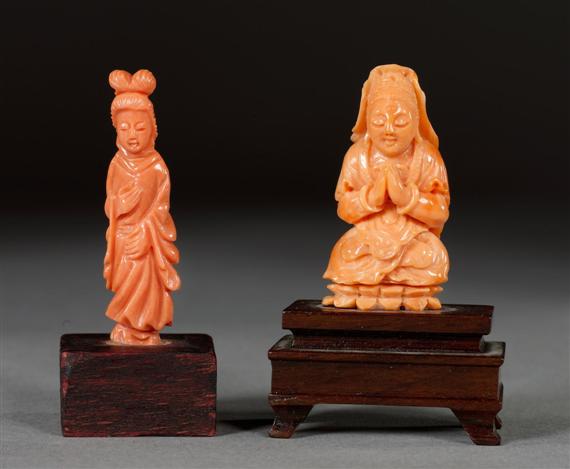 Appraisal: TWO CARVED CORAL FIGURINES China Republic period height and cm