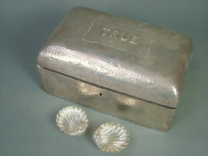 Appraisal: A Victorian silver jewel box with hammered finish the lid