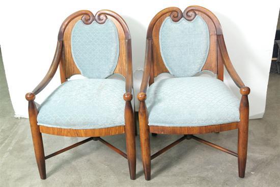 Appraisal: PAIR OF ARMCHAIRS Walnut and veneered with scrolled crests curved