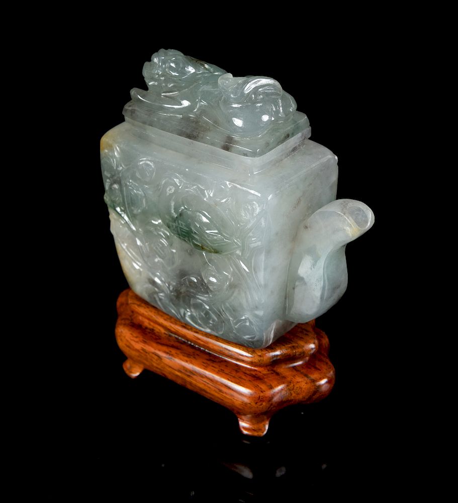 Appraisal: A Chinese Green and White Jadeite Teapot Height in cm