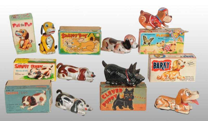 Appraisal: Lot of Tin Dog Friction Wind-Up Toys Description Post-war Japanese