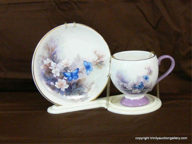 Appraisal: Blossoms and Butterflies Designer Cup and Saucer - exclusively by