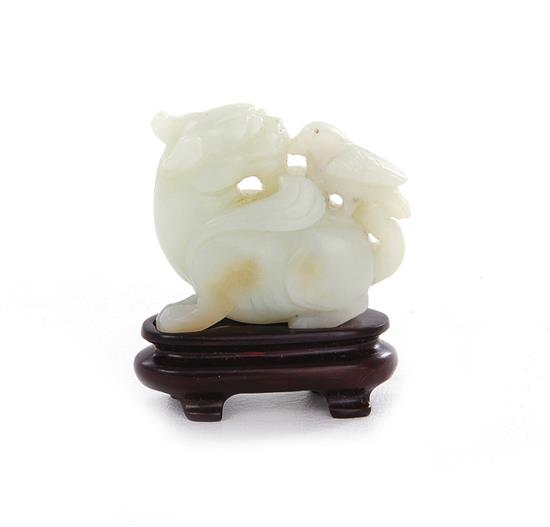 Appraisal: Chinese carved celadon jade archaic Kylin with bird probably Qing