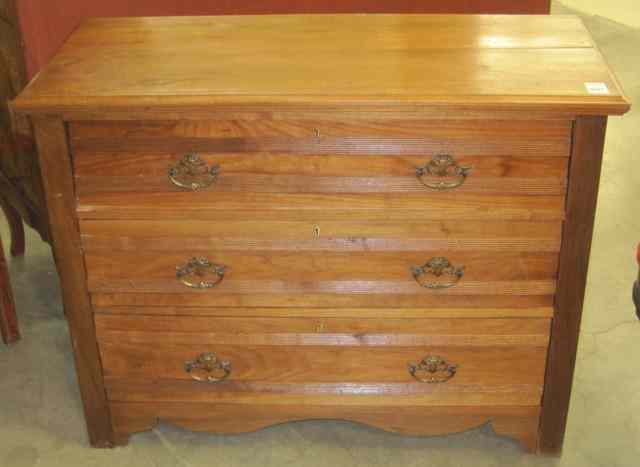 Appraisal: VICTORIAN WALNUT CHEST OF DRAWERS American last quarter of the