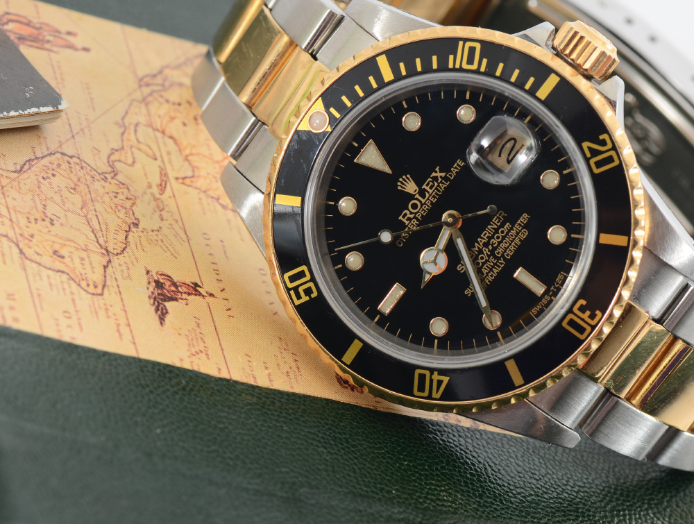 Appraisal: ROLEX SUBMARINER K AND STAINLESS WRISTWATCH Chronometer Model serial Black