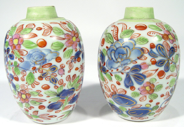 Appraisal: Pair of oriental porcelain vases of ovoid form hand painted