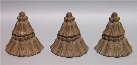 Appraisal: THREE TASSLE-FORM ORNAMENTS Each of composite and stained in a