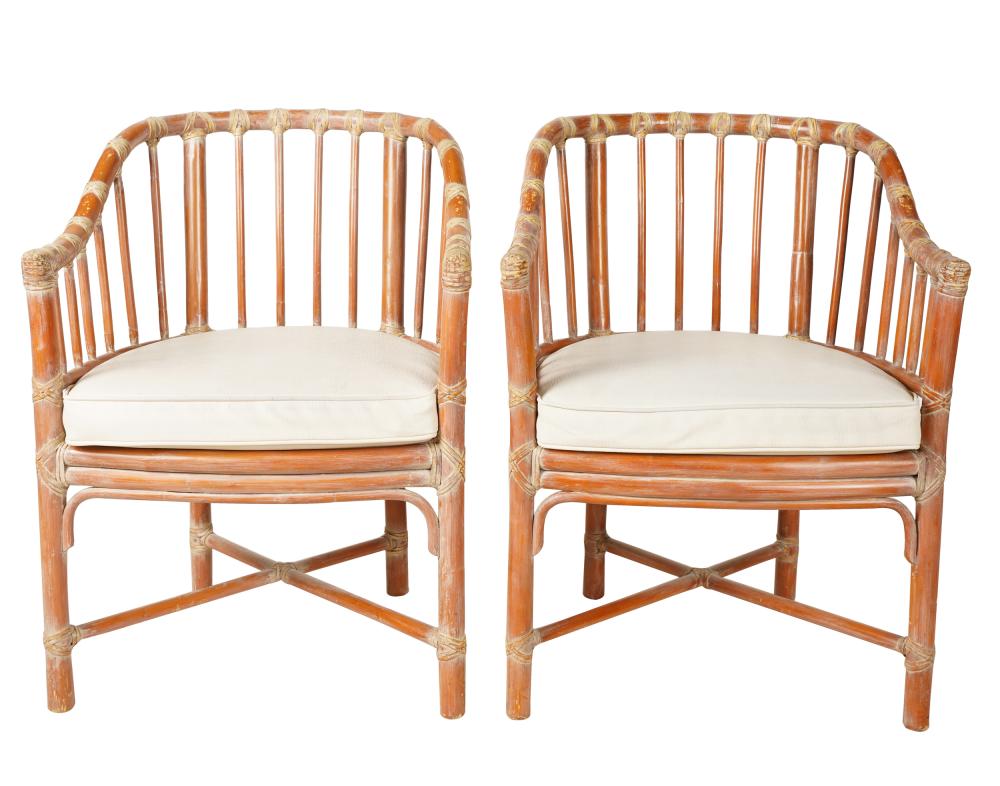 Appraisal: PAIR OF MCGUIRE RED-PAINTED RATTAN ARMCHAIRSwith metal manufacturer's tag each