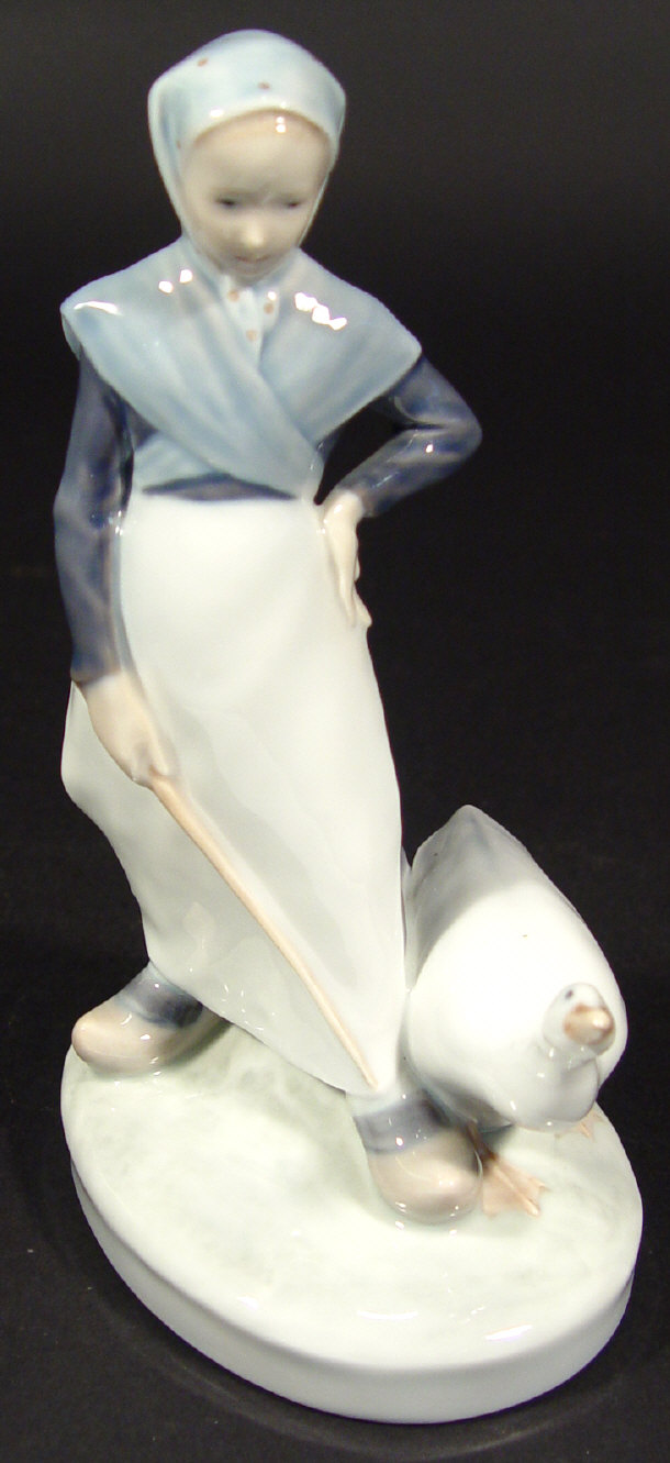 Appraisal: Royal Copenhagen porcelain Dutch girl and goose with hand painted