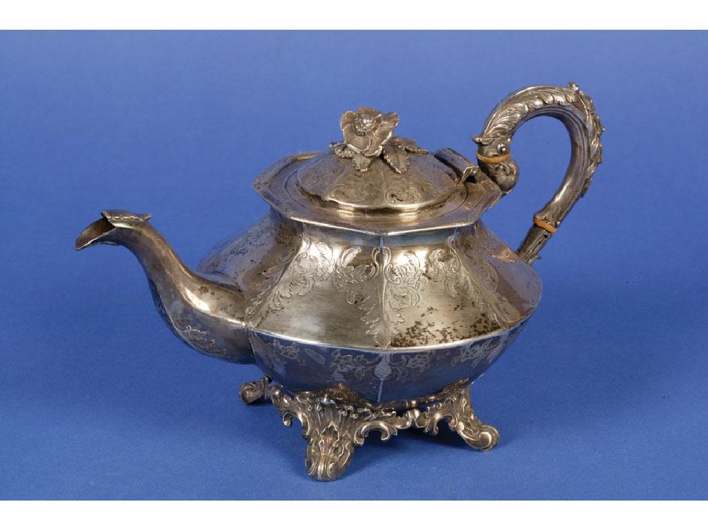 Appraisal: AN EARLY VICTORIAN TEAPOT of melon form with a leaf-capped