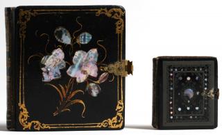 Appraisal: Black Lacquer Mother Comprising two book-style lacquer frames with mother-of-pearl