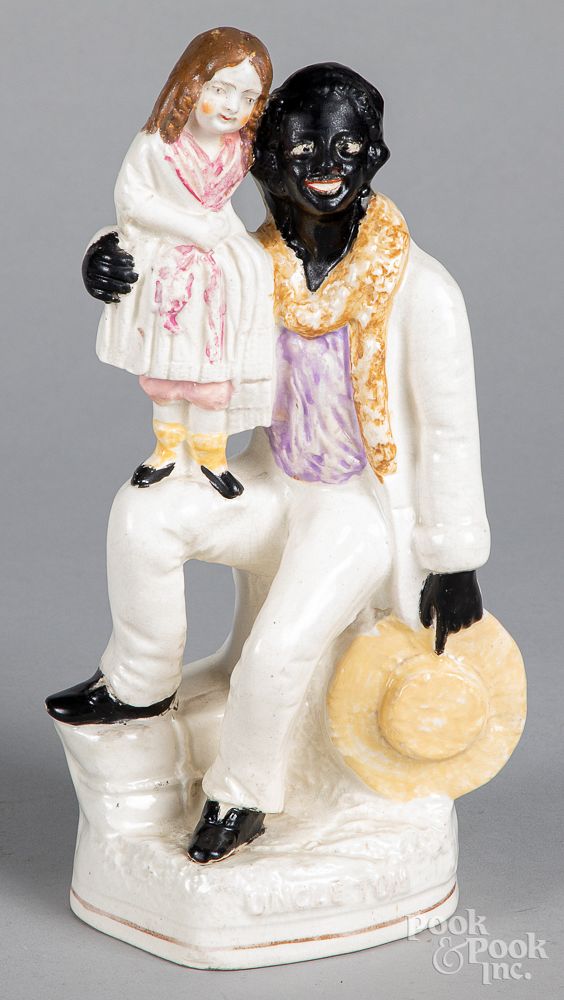 Appraisal: Staffordshire porcelain Staffordshire Uncle Tom and Little Eva porcelain figure