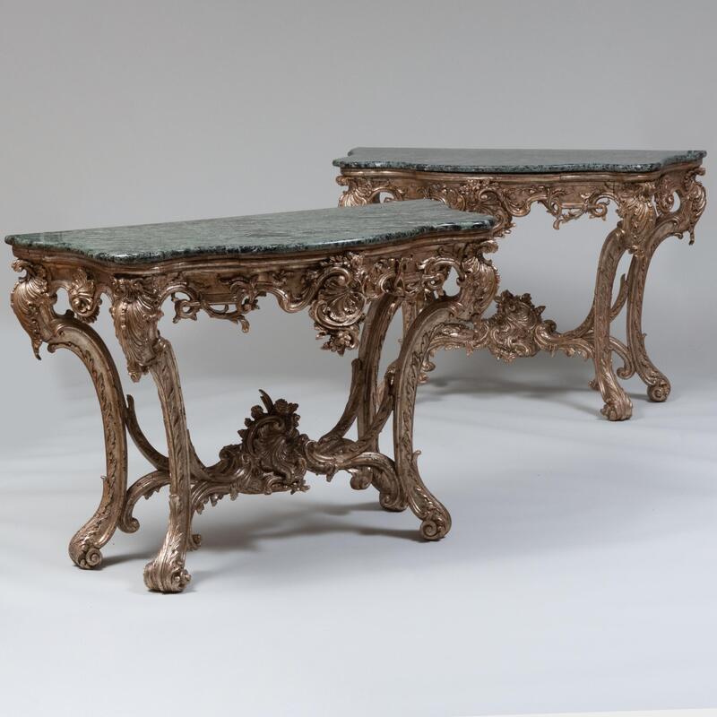 Appraisal: Fine Pair of Italian Rococo Silver-Gilt Console Tables Both fitted