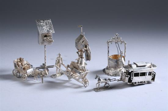 Appraisal: SIX CONTINENTAL SILVER MINIATURES Including goat-drawn carriage horse-drawn trolley bird