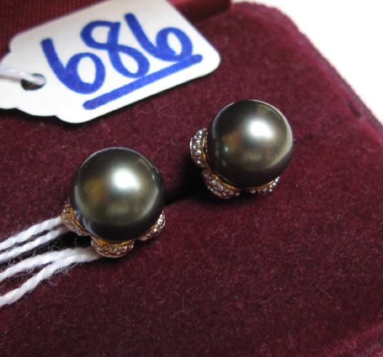 Appraisal: PAIR OF BLACK PEARL AND EIGHTEEN KARAT GOLD EAR STUDS