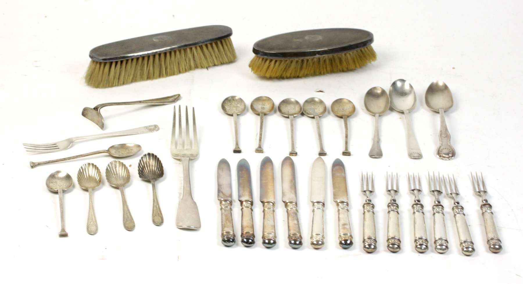 Appraisal: A set of six silver-handled fruit knives and forks marks