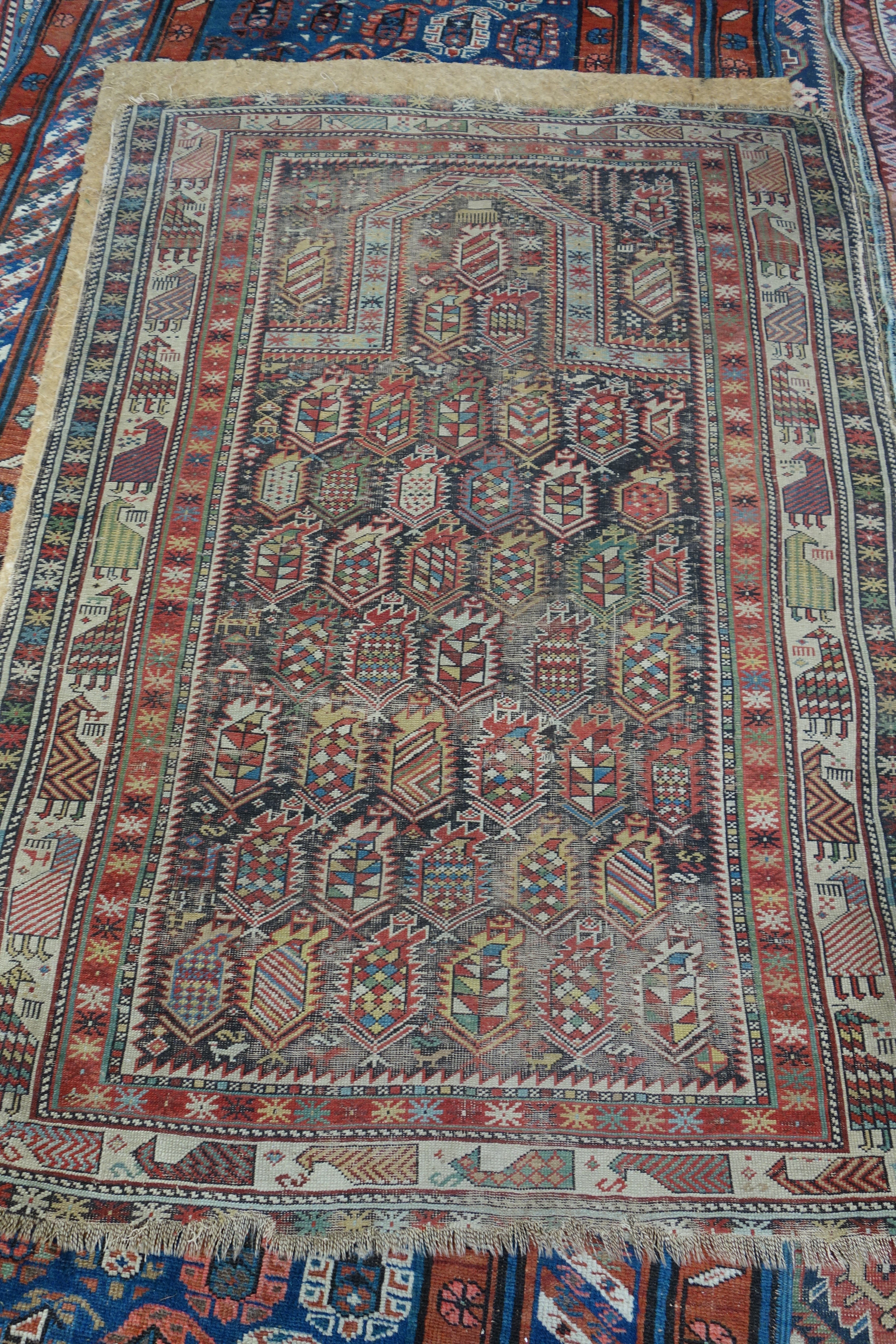 Appraisal: A Marasali prayer rug Caucasian the black mehrab filled with