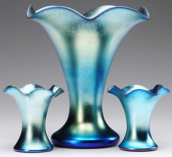 Appraisal: STEUBEN Three blue Aurene vases with ruffled rims All etched