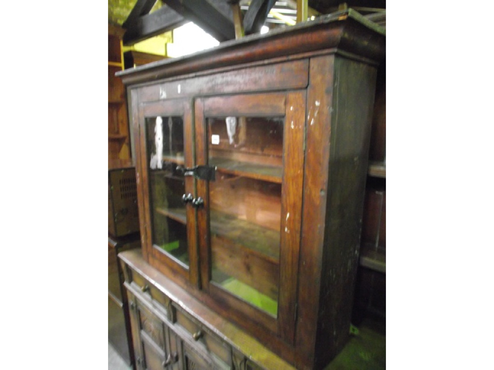 Appraisal: A th century oak wall mounted bookcase display cabinet with