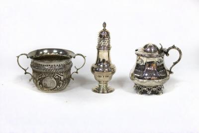 Appraisal: A Victorian silver mustard pot RH London with engraved decoration