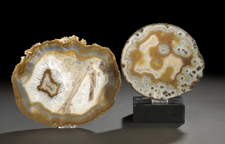 Appraisal: Two Sliced and Polished Ovoid Geode Sections one exhibiting an