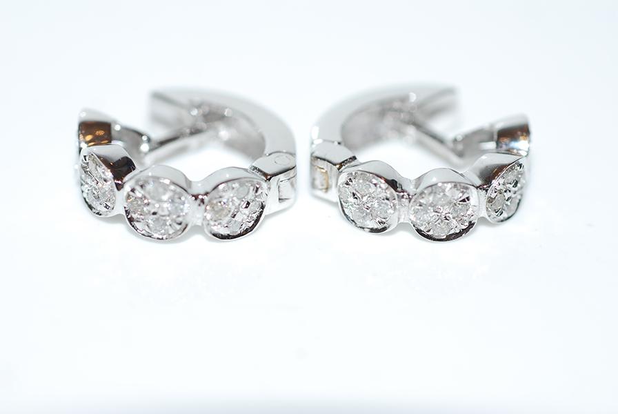 Appraisal: A PAIR OF DIAMOND SET HOOP EARRINGS IN CT WHITE